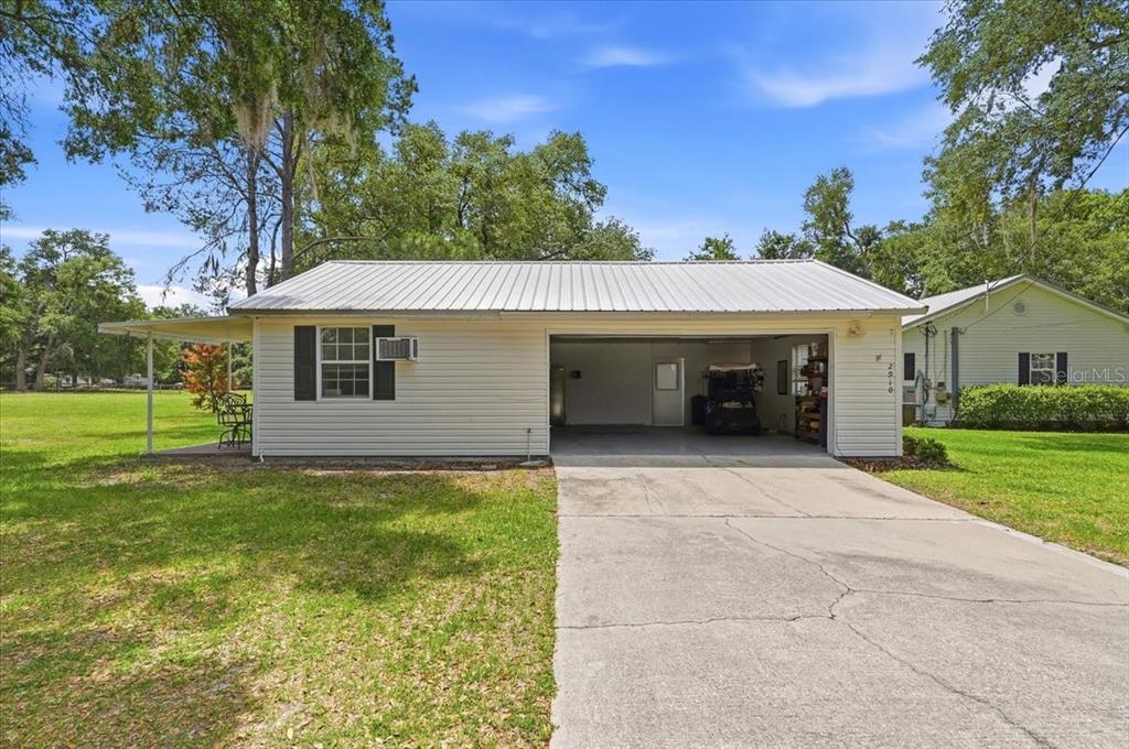 2910 Fritzke Road Dover, FL 33527 - Photo 86 of 100 a view of a house with backyard and garden
