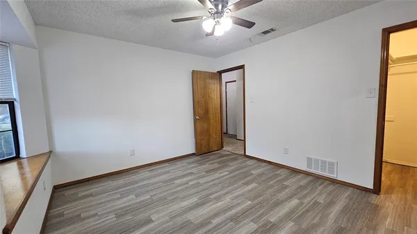 a view of an empty walk in closet
