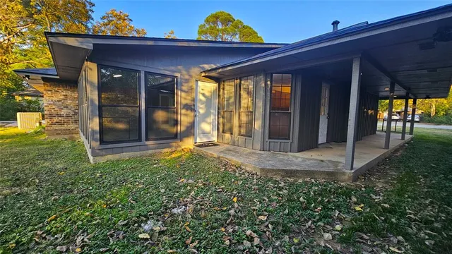 a view of a trees with yard