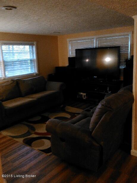 7416 Manslick Road Louisville, KY 40214 - Photo 16 of 26 7416 Manslick downstair familyroom 1