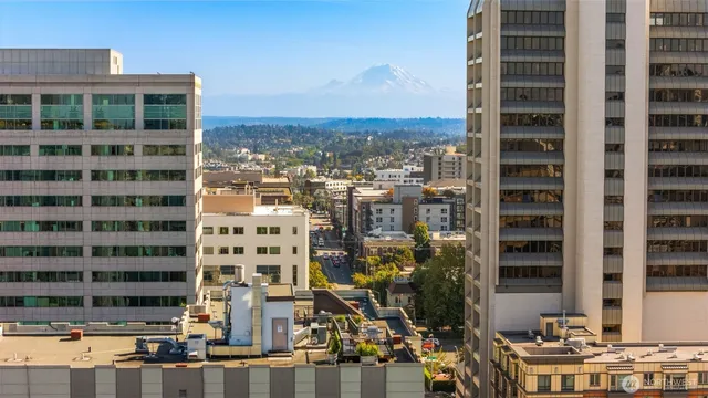 a view of a city with tall buildings