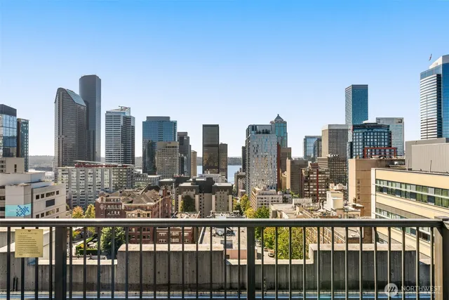 a view of a city skyline from a balcony