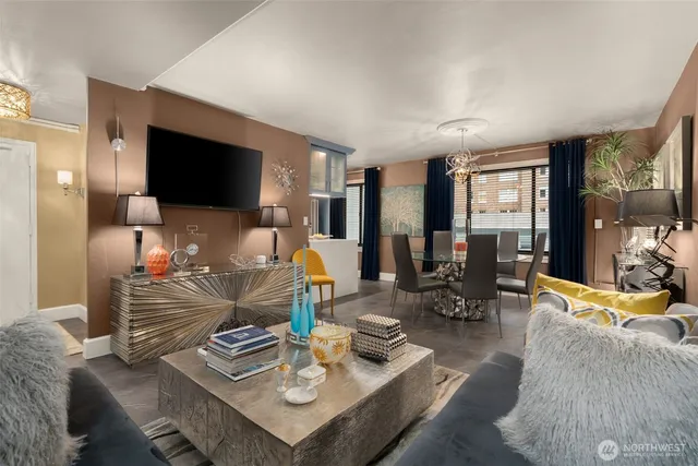 a living room with furniture and a flat screen tv