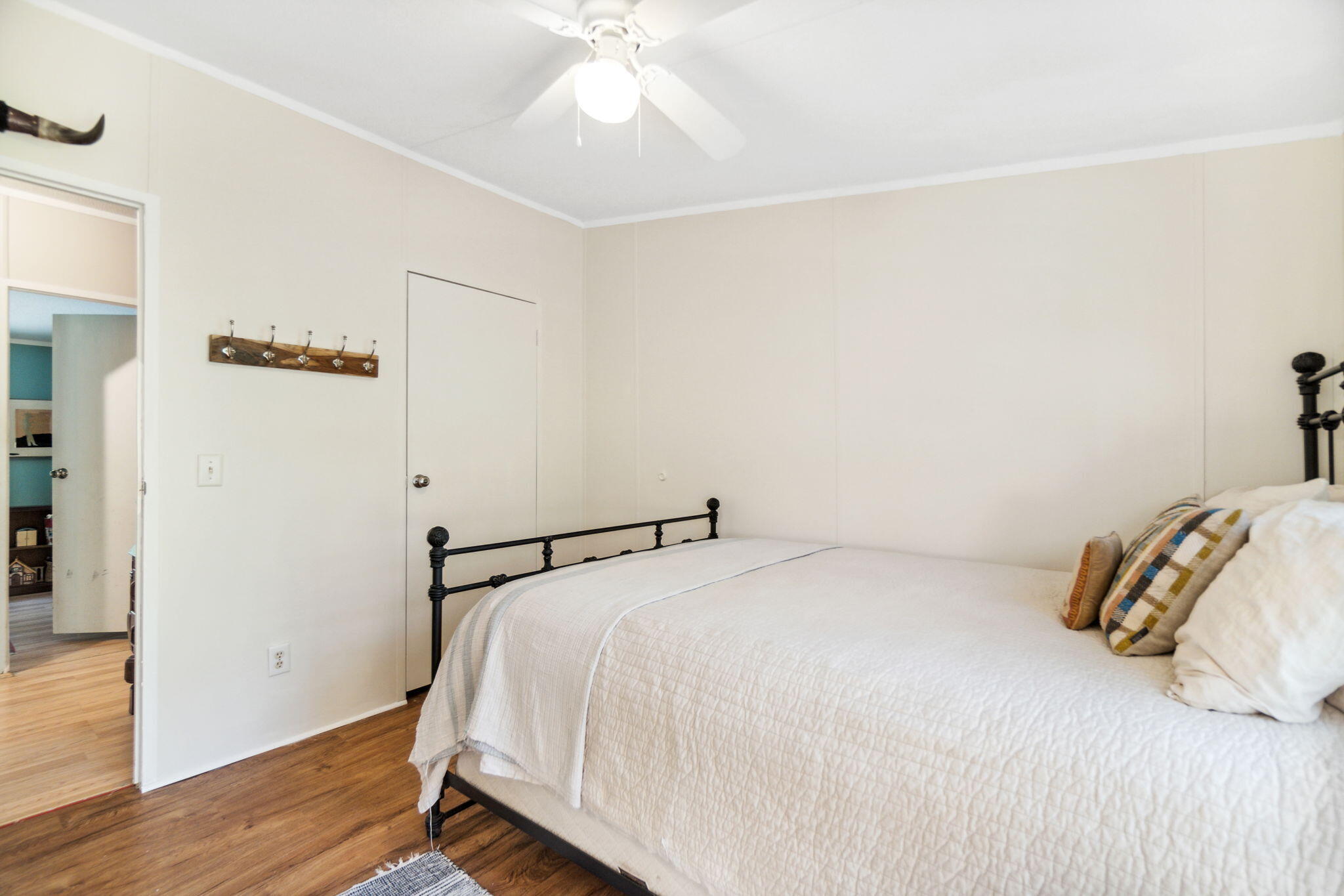 232 Churchill Bayou Road Santa Rosa Beach, FL 32459 - Photo 21 of 32 a bedroom with a bed and a ceiling fan