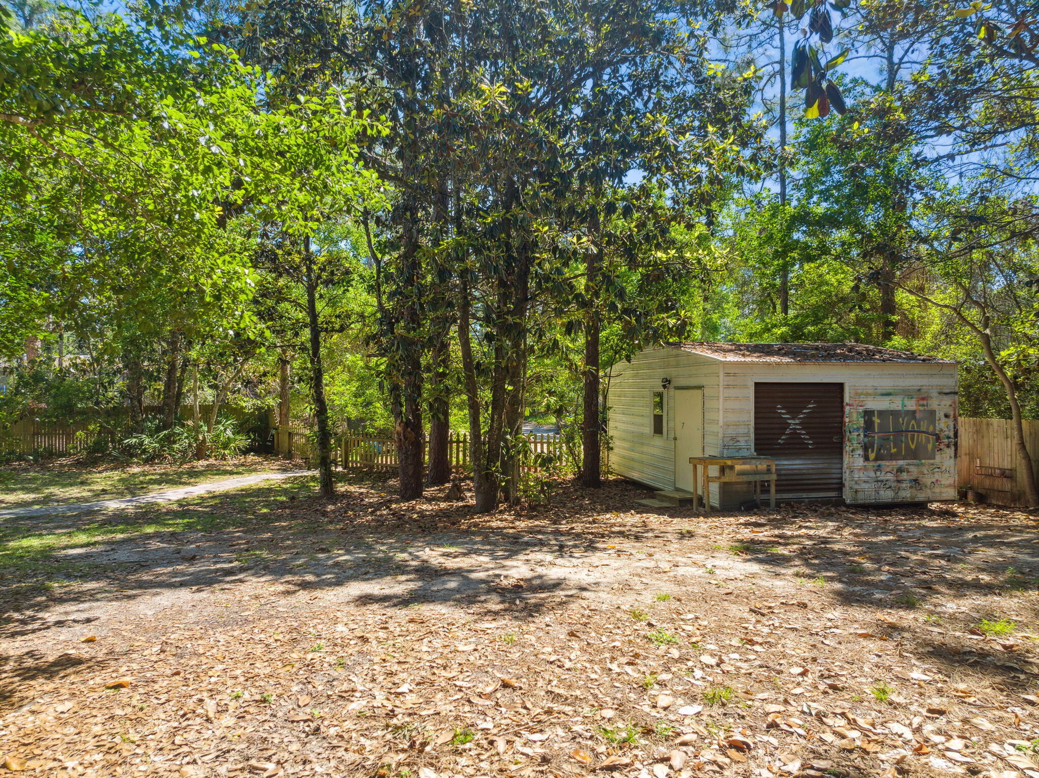 232 Churchill Bayou Road Santa Rosa Beach, FL 32459 - Photo 28 of 32 a view of a house with a yard