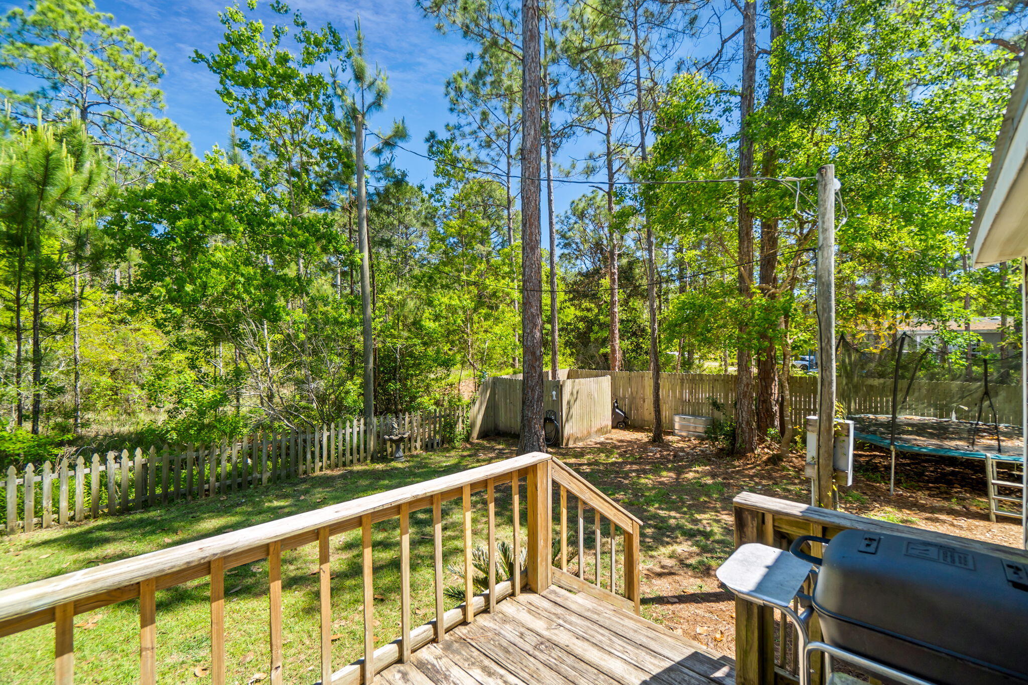 232 Churchill Bayou Road Santa Rosa Beach, FL 32459 - Photo 3 of 32 a view of a balcony with chairs