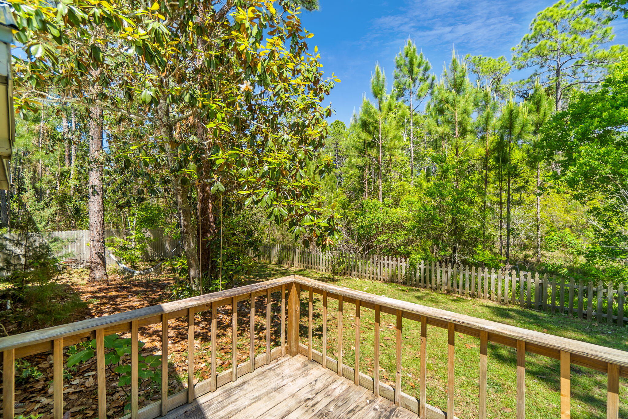 232 Churchill Bayou Road Santa Rosa Beach, FL 32459 - Photo 4 of 32 a view of a wooden fence