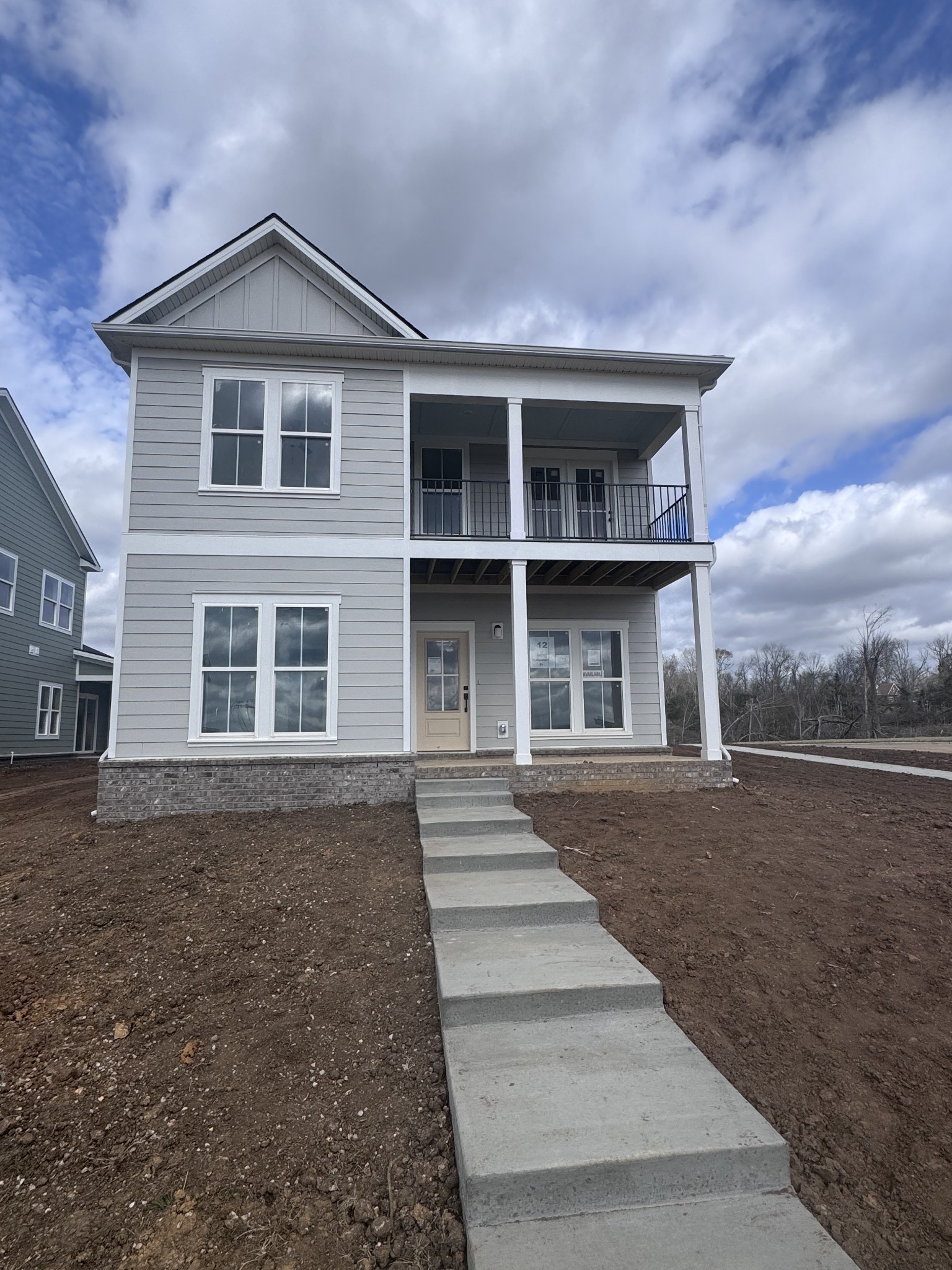 a front view of a house with yard