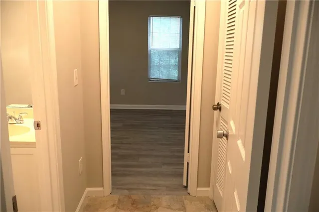 a bathroom with a sink and toilet