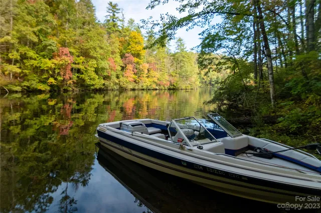 a view of a backyard with sitting area