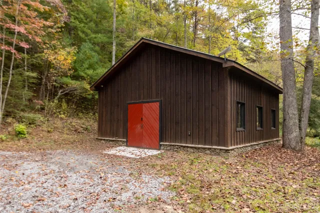 a house with trees in the background