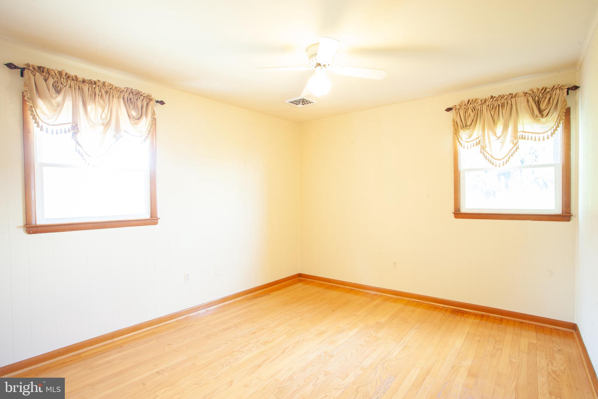 3056 Marston Road Westminster, MD 21157 - Photo 17 of 47 Bedroom 2- with wood floor and ceiling fan