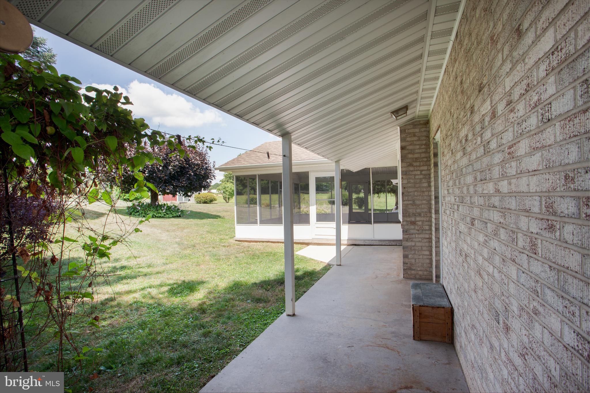 3056 Marston Road Westminster, MD 21157 - Photo 36 of 47 Covered walkway from garage to screen room