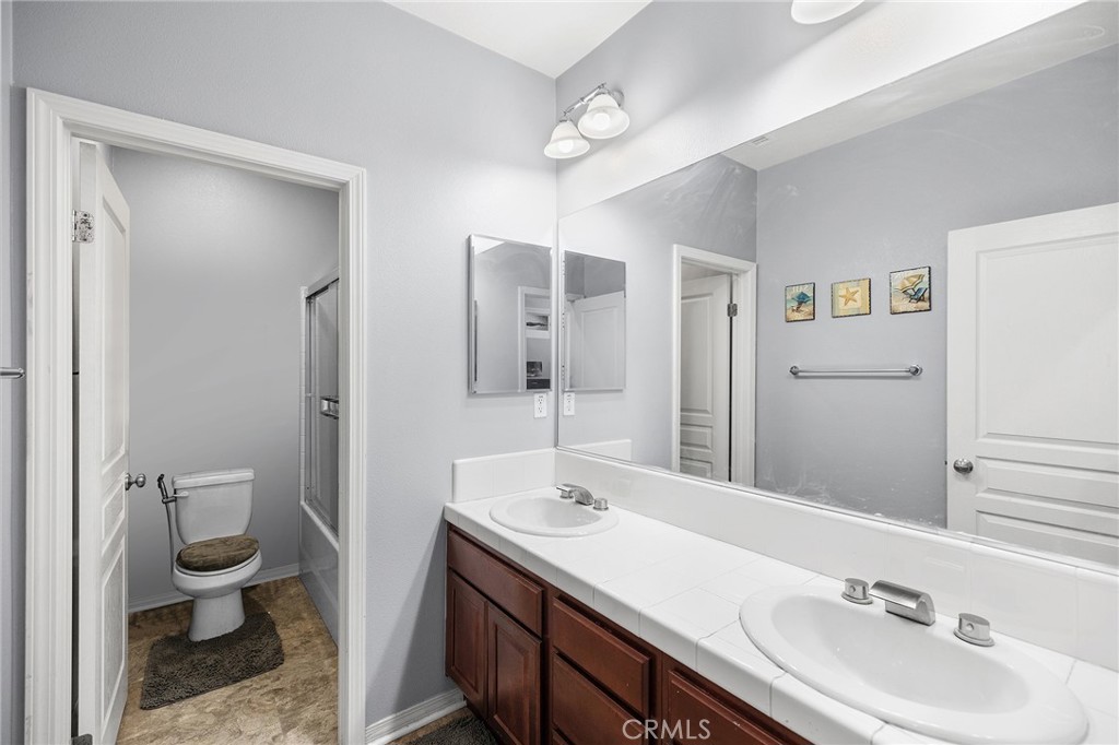 46212 Pinon Pine Way Temecula, CA 92592 - Photo 20 of 55 hall bathroom