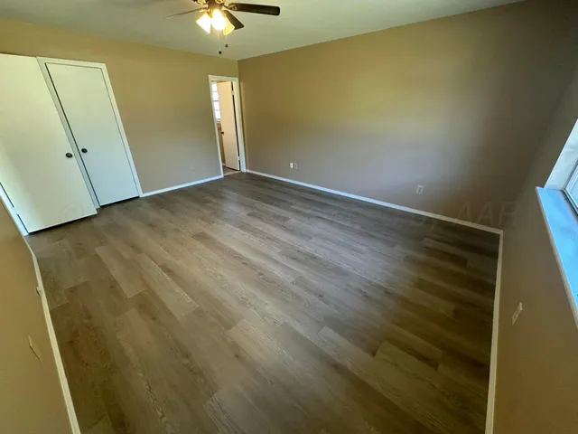 a view of an empty walk in closet
