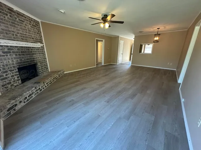 a bathroom with a tub sink and vanity