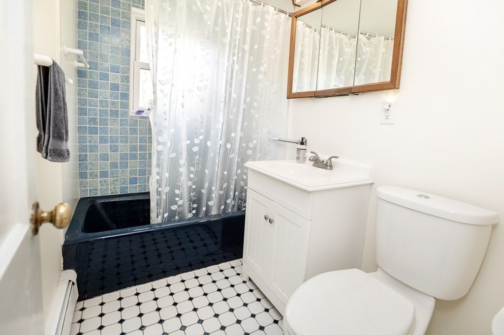 89 Whitney Road Ashby, MA 01431 - Photo 12 of 30 a bathroom with a sink toilet and shower