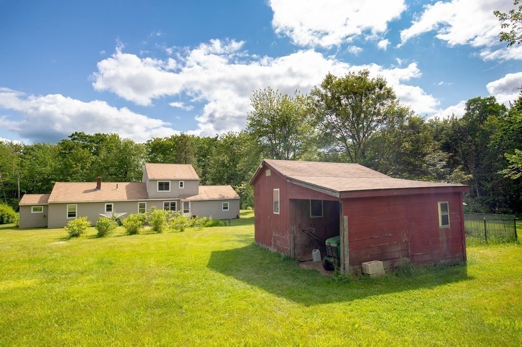 89 Whitney Road Ashby, MA 01431 - Photo 21 of 30 a view of a house with a yard