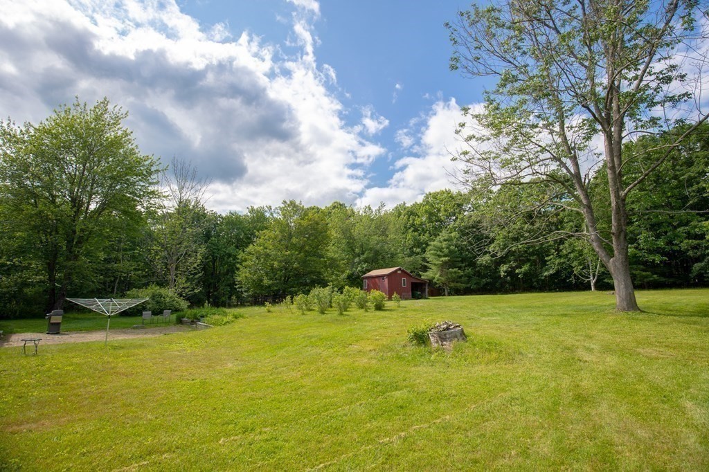 89 Whitney Road Ashby, MA 01431 - Photo 27 of 30 a view of swimming pool with a yard