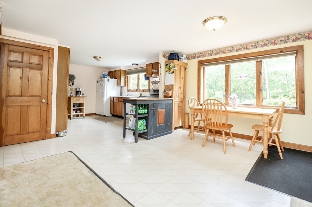 89 Whitney Road Ashby, MA 01431 - Photo 6 of 30 a view of a livingroom with workspace and a window