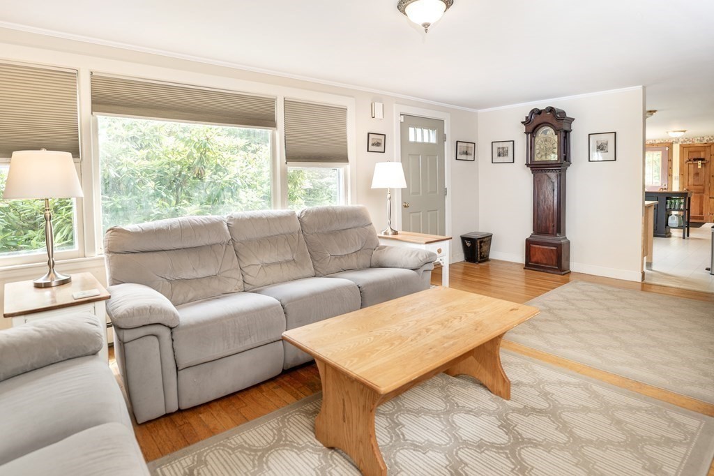 89 Whitney Road Ashby, MA 01431 - Photo 9 of 30 a living room with furniture and large window