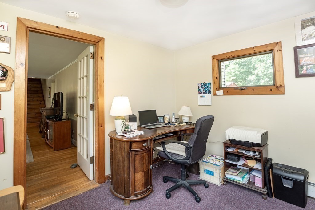 89 Whitney Road Ashby, MA 01431 - Photo 10 of 30 a view of a workspace with furniture and a window