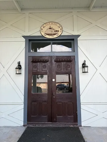 a view of a hallway with entryway