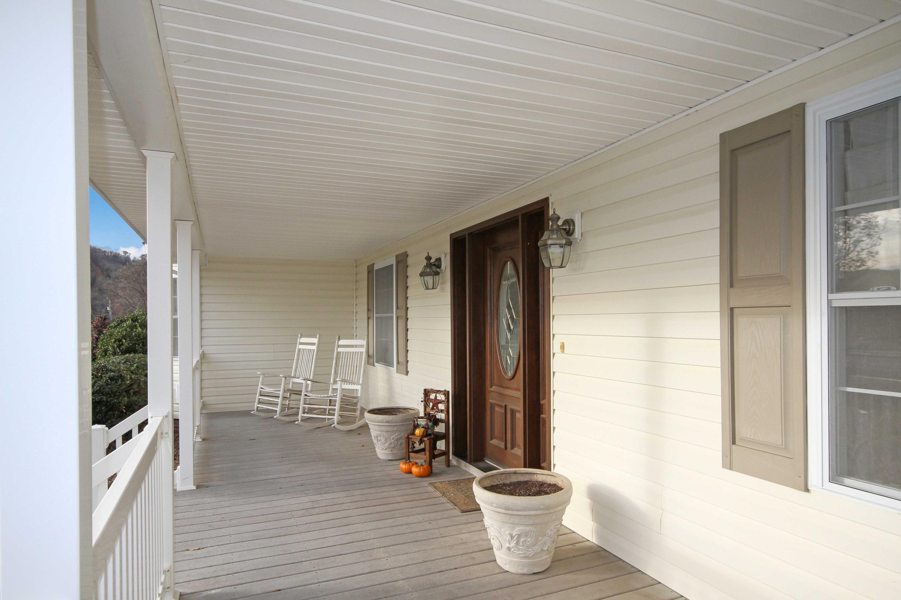 4690 Crosier Road Elliston, VA 24087 - Photo 12 of 79 a room with wooden floor and furniture