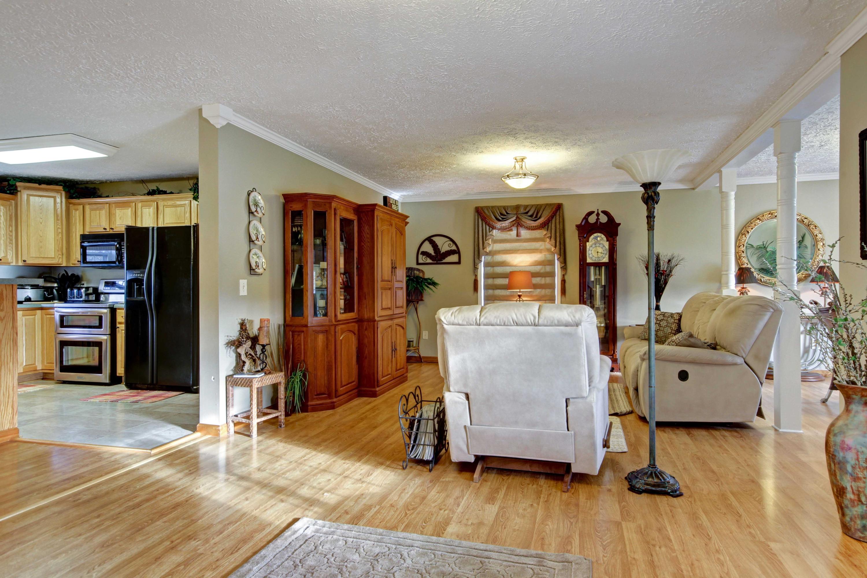 4690 Crosier Road Elliston, VA 24087 - Photo 13 of 79 a view of living room with furniture and wooden floor