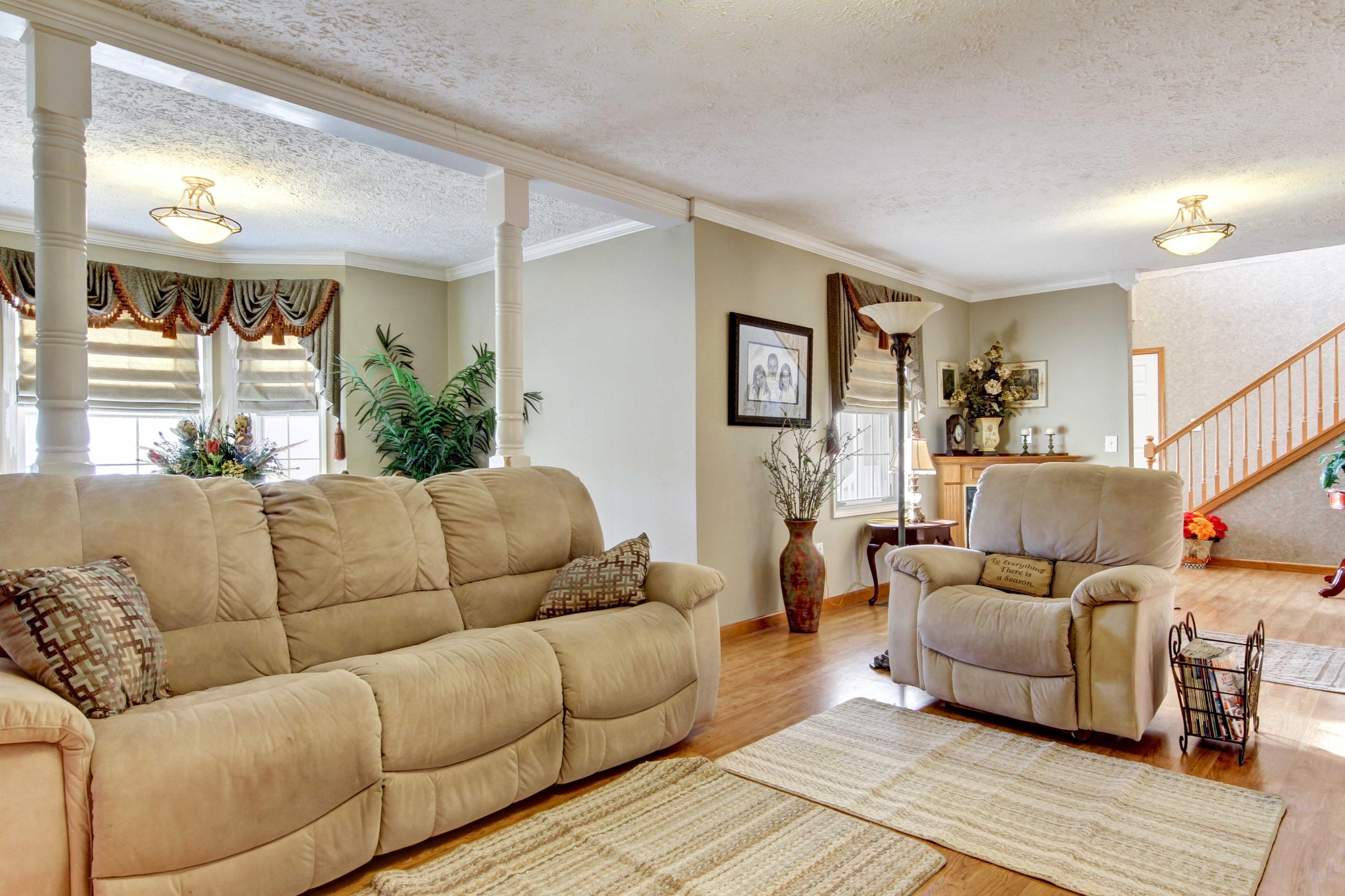 4690 Crosier Road Elliston, VA 24087 - Photo 16 of 79 a living room with furniture and a couch