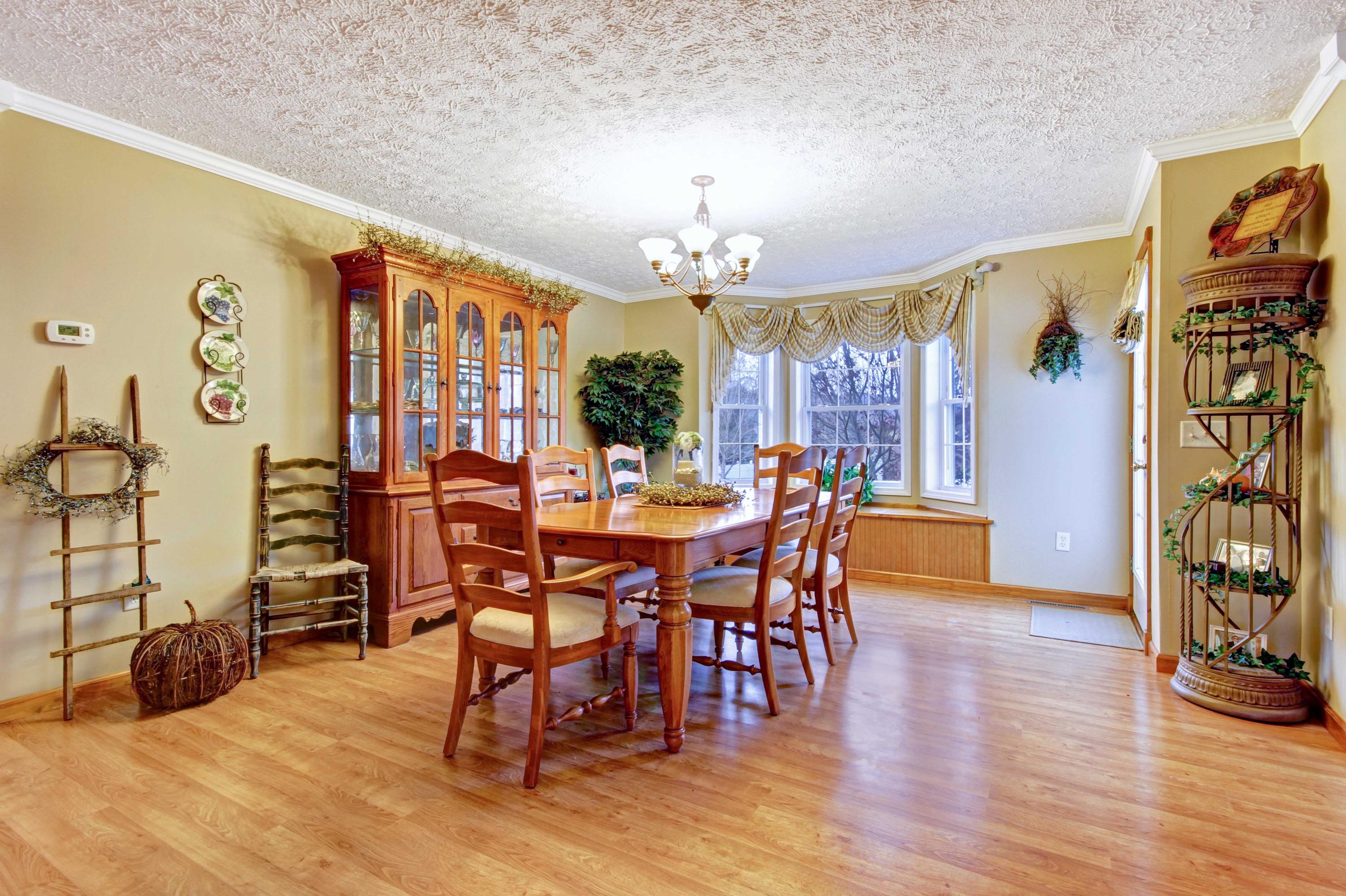 4690 Crosier Road Elliston, VA 24087 - Photo 26 of 79 a view of a dining room with furniture and wooden floor