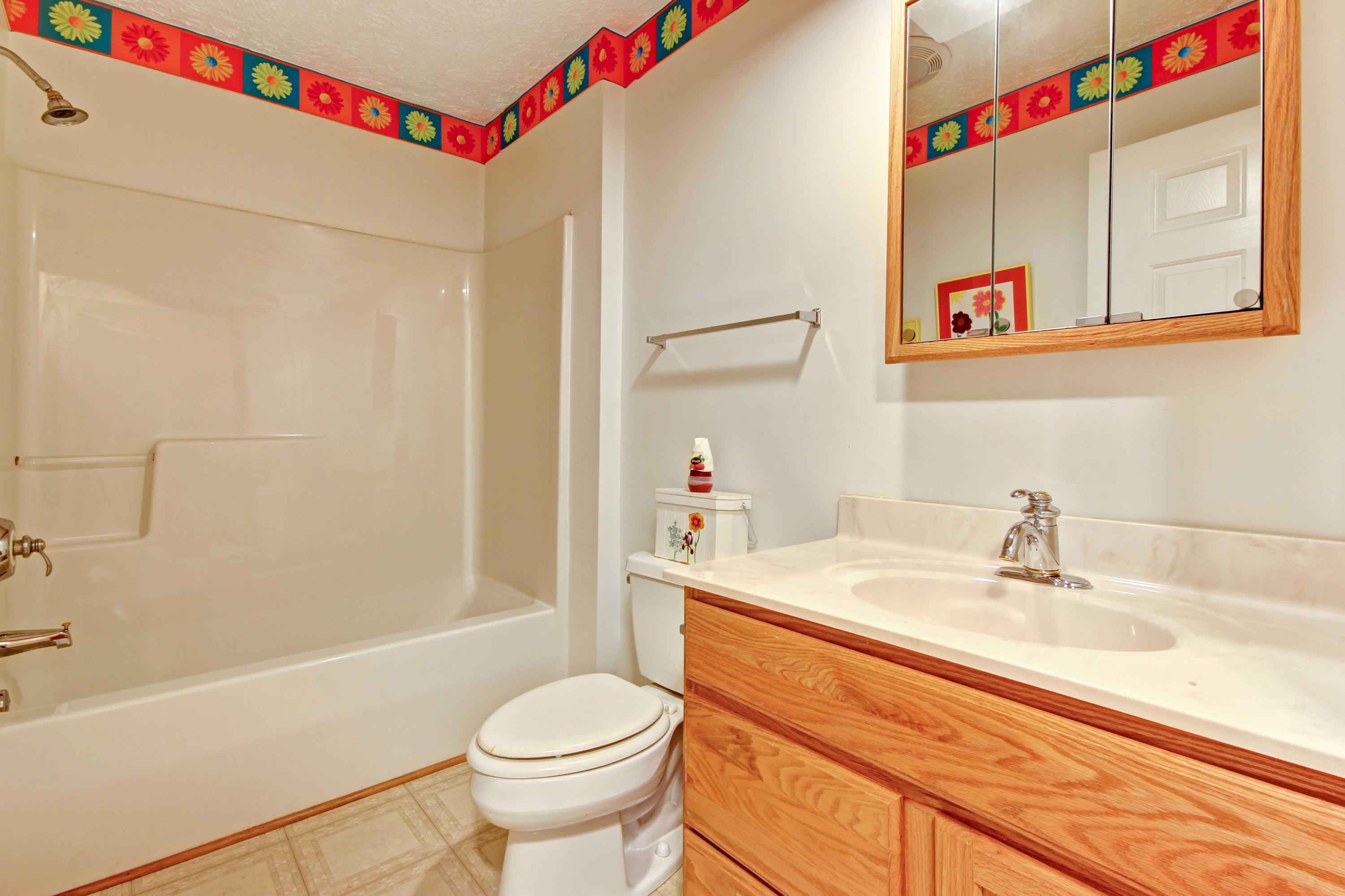 4690 Crosier Road Elliston, VA 24087 - Photo 43 of 79 a bathroom with a sink a toilet and shower