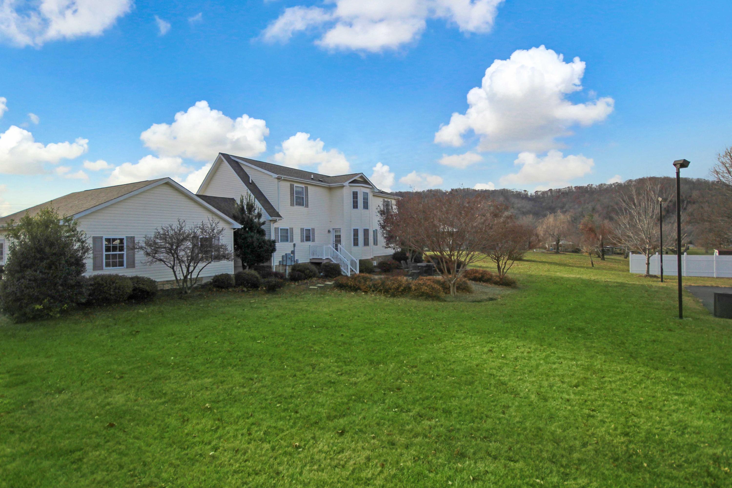4690 Crosier Road Elliston, VA 24087 - Photo 68 of 79 a view of a house with a yard