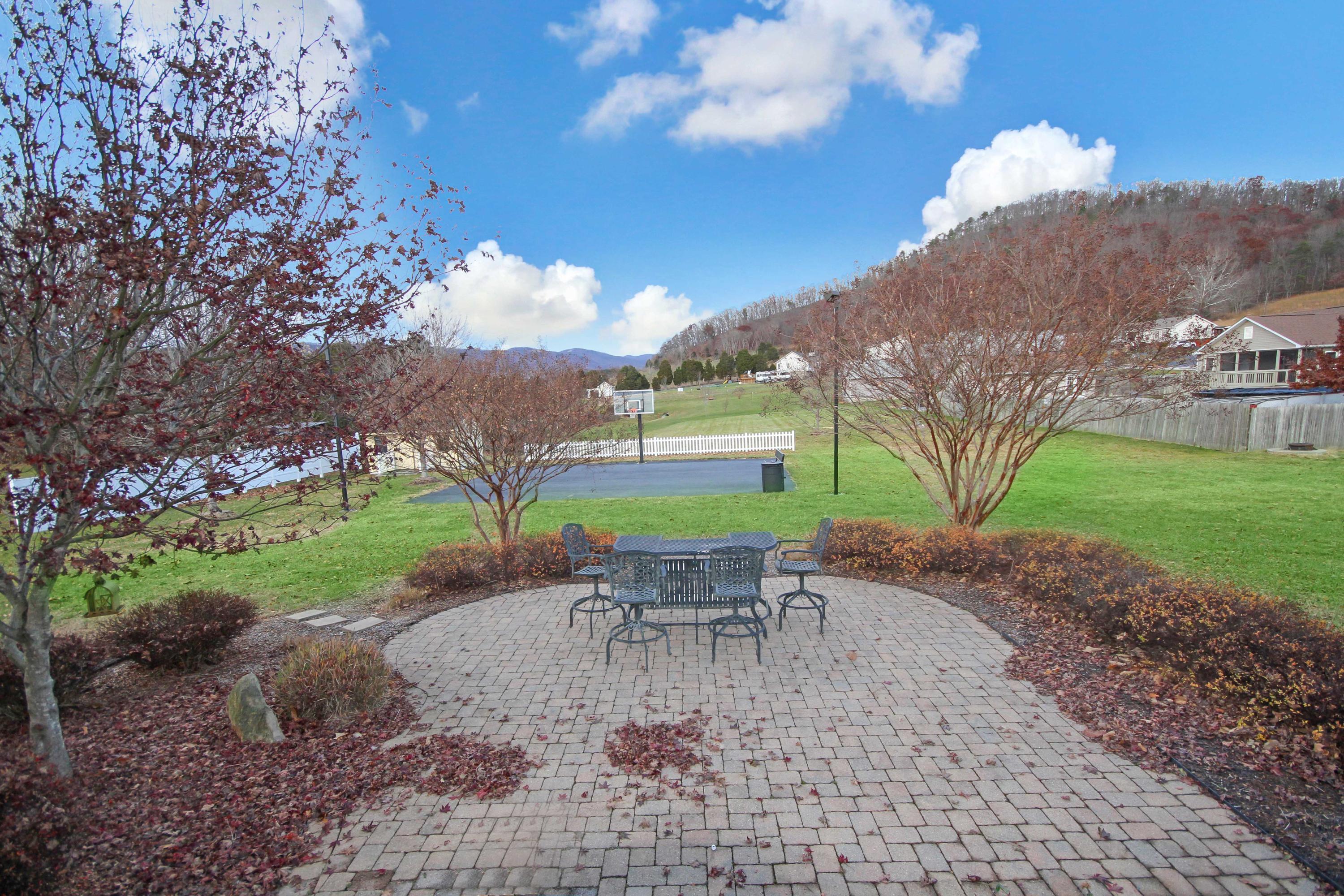 4690 Crosier Road Elliston, VA 24087 - Photo 71 of 79 a view of a backyard with sitting area