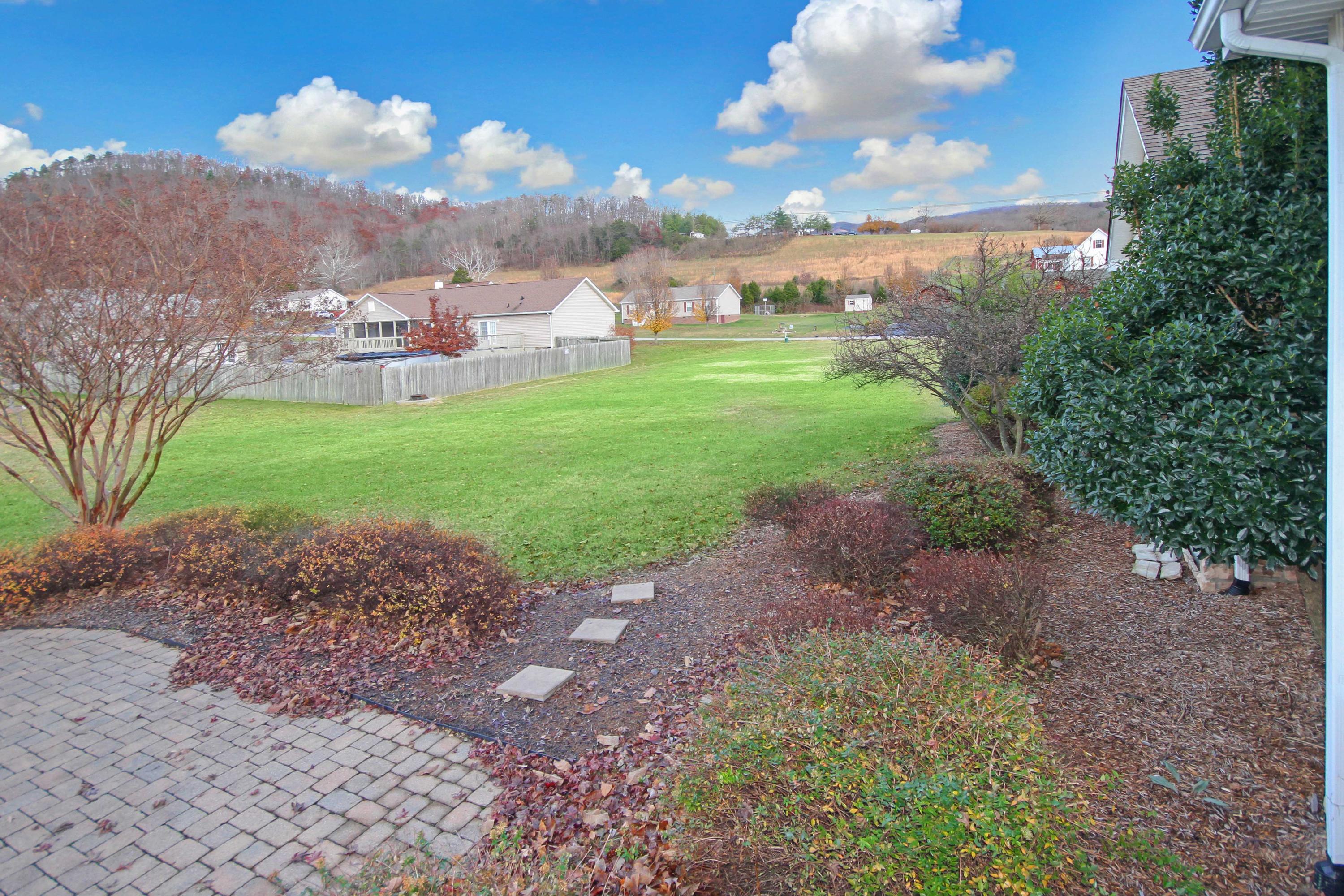 4690 Crosier Road Elliston, VA 24087 - Photo 72 of 79 a view of a big yard with a fountain and a big yard