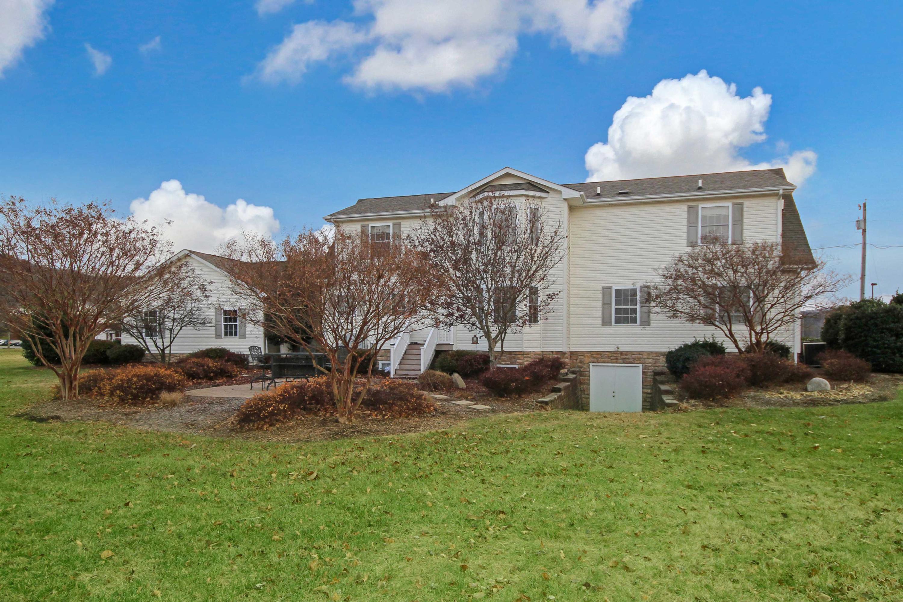 4690 Crosier Road Elliston, VA 24087 - Photo 75 of 79 a front view of a house with garden