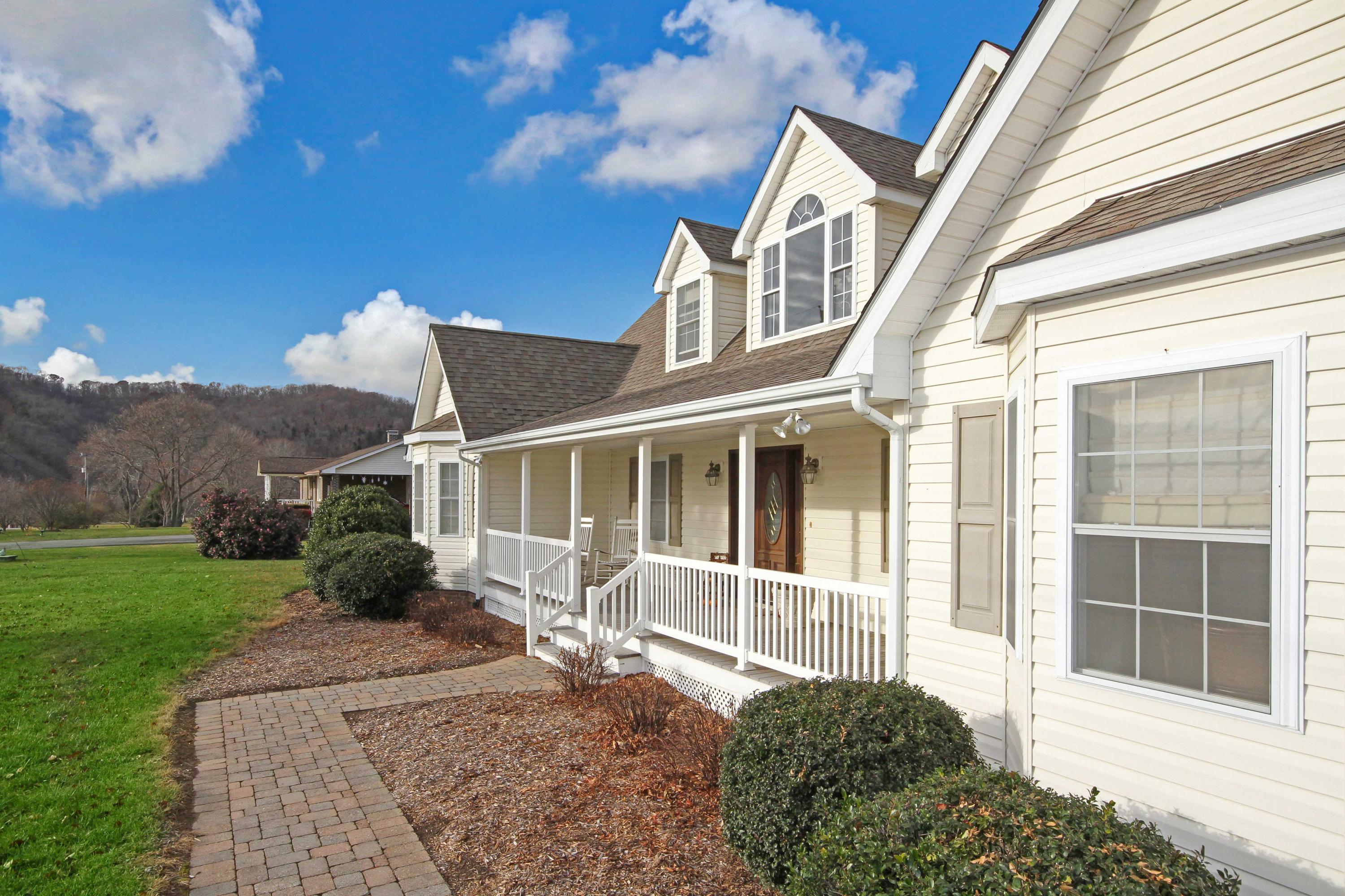 4690 Crosier Road Elliston, VA 24087 - Photo 10 of 79 a front view of a house with a yard