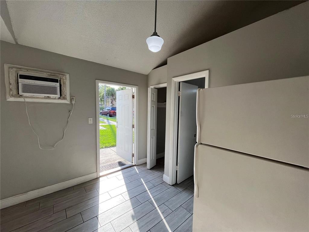 2795 L B McLeod Road, Unit C Orlando, FL 32805 - Photo 3 of 5 a view of a hallway with interior of the house