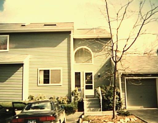 38 Glen Ridge, Unit 38 Wilton, CT 06897 - Photo 1 of 1 a view of a house with a patio