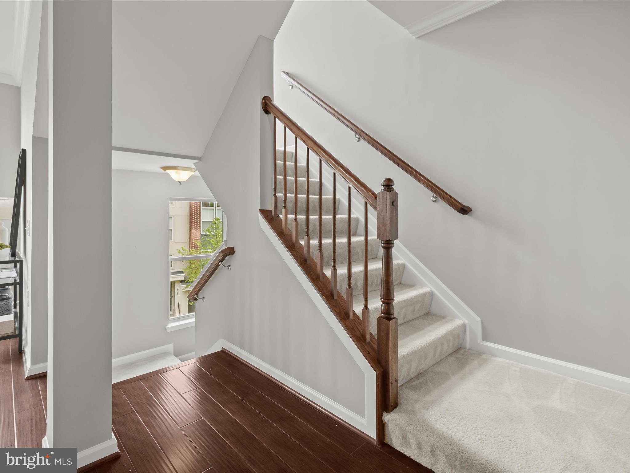 179 Copley Circle, Unit 30B Gaithersburg, MD 20878 - Photo 27 of 41 a view of entryway and hall with wooden floor