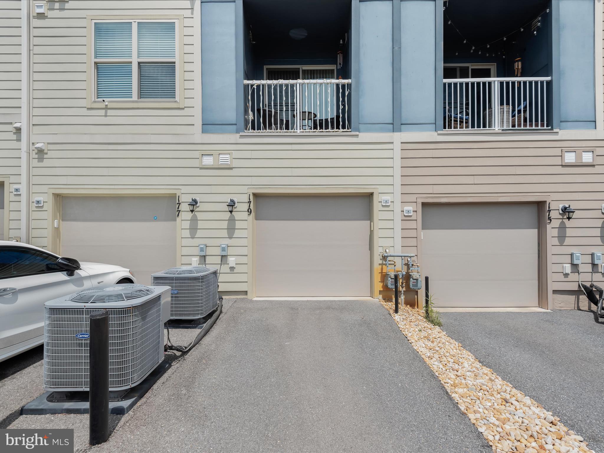 179 Copley Circle, Unit 30B Gaithersburg, MD 20878 - Photo 39 of 41 a front view of a house with barbeque oven
