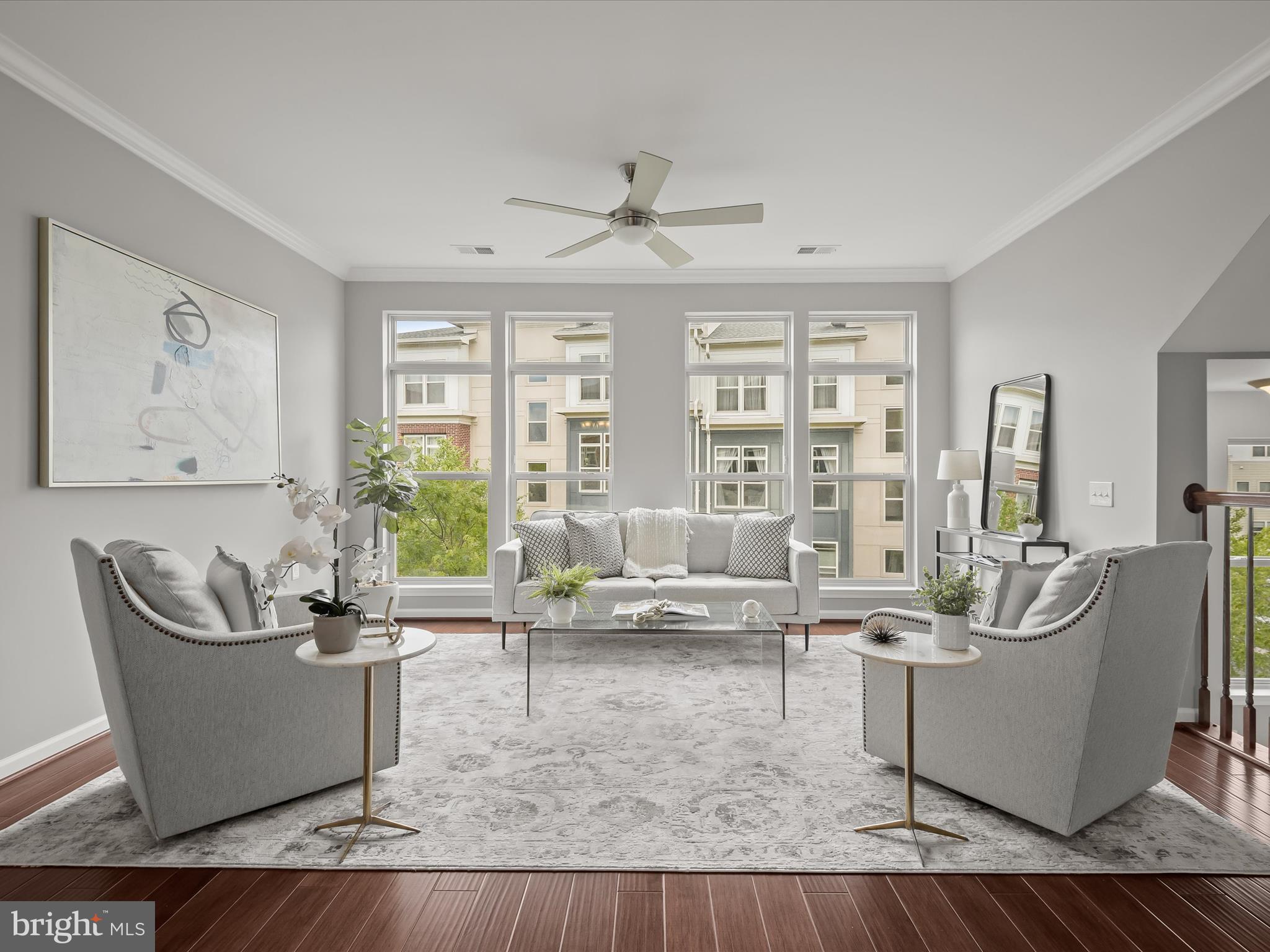 179 Copley Circle, Unit 30B Gaithersburg, MD 20878 - Photo 6 of 41 a living room with furniture and large windows