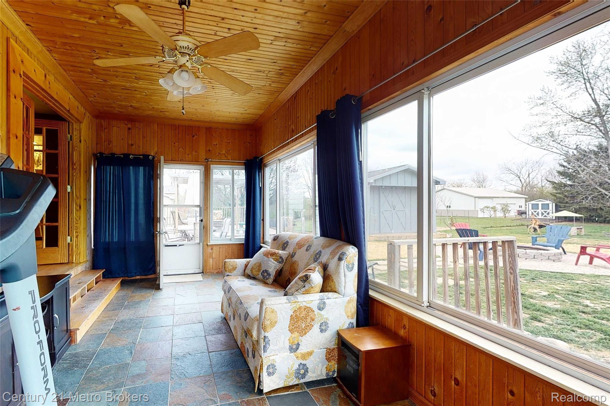 8384 Fenton Road Grand Blanc, MI 48439 - Photo 39 of 48 8384-Fenton-Rd-14 Sunroom.jpg