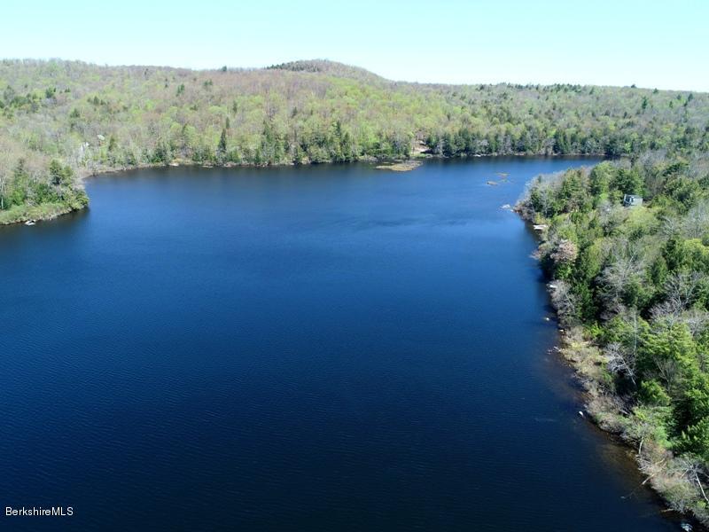 57 Hayes Pond Road Otis, MA 01253 - Photo 35 of 36 an aerial view of a house with a yard
