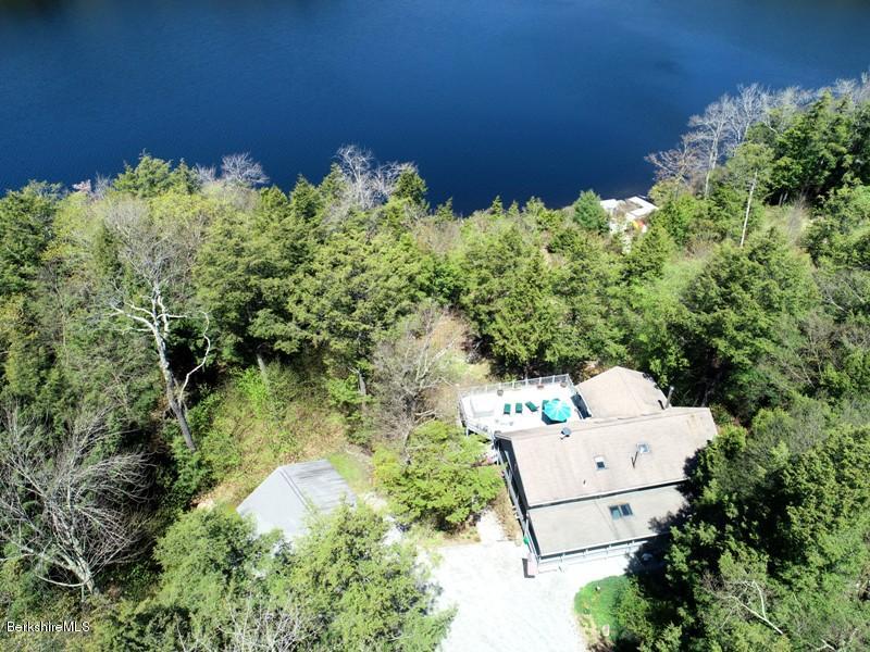 57 Hayes Pond Road Otis, MA 01253 - Photo 6 of 36 an aerial view of a house with a yard