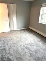 an empty room with a natural light