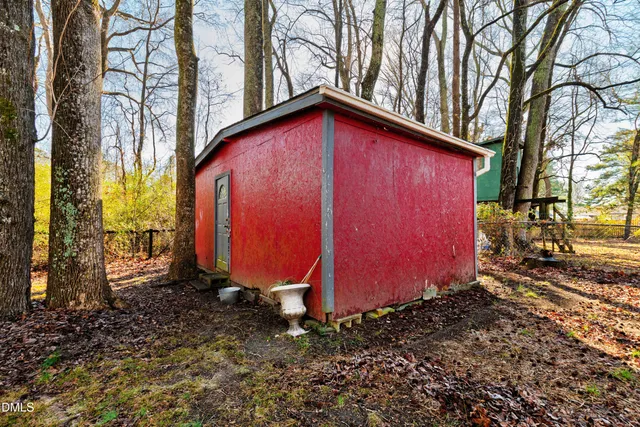 a view of a backyard with a trees