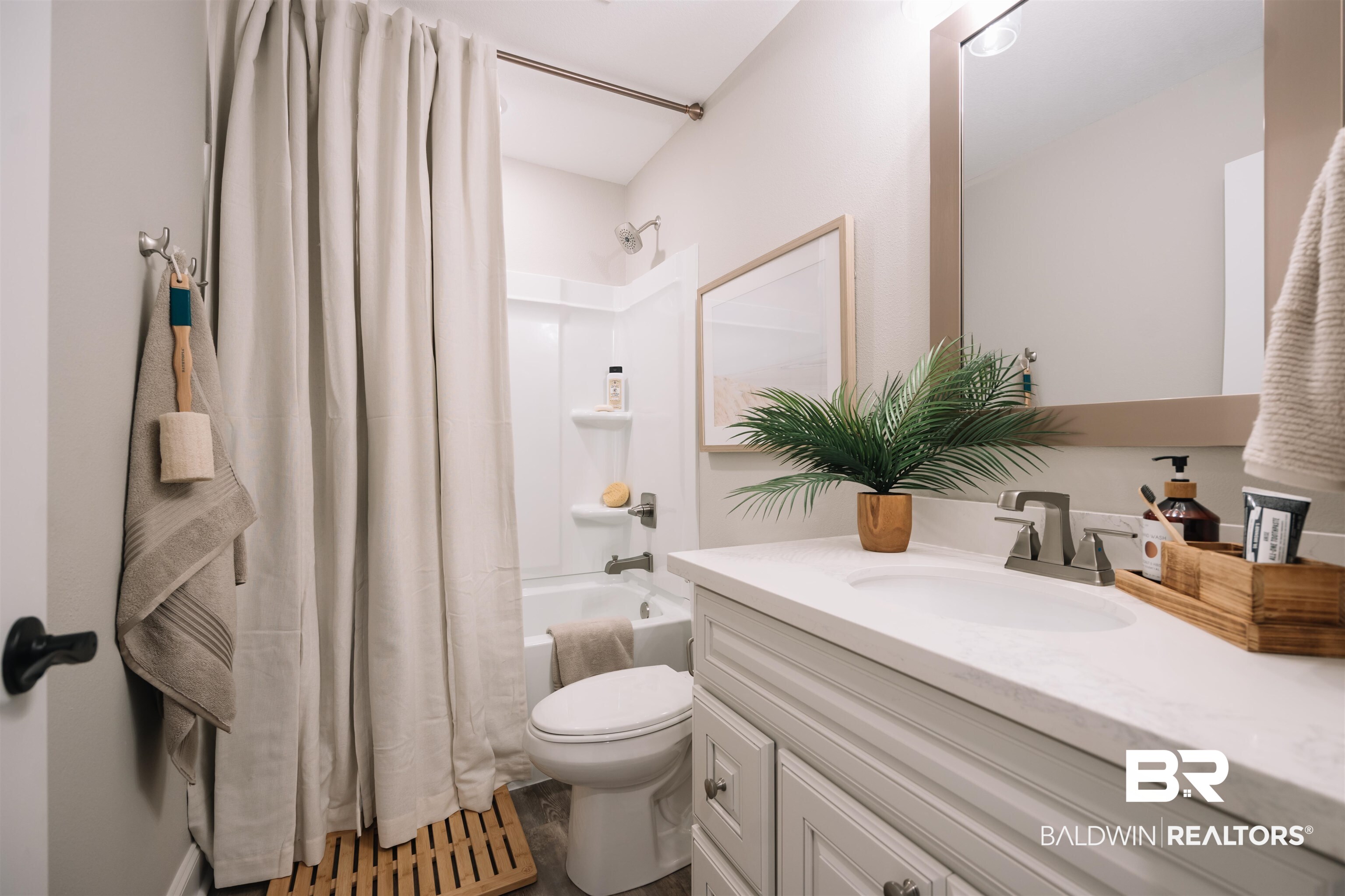 12894 Flanagan Street Elberta, AL 36530 - Photo 21 of 29 Full bathroom featuring shower / bath combo, toilet, and vanity