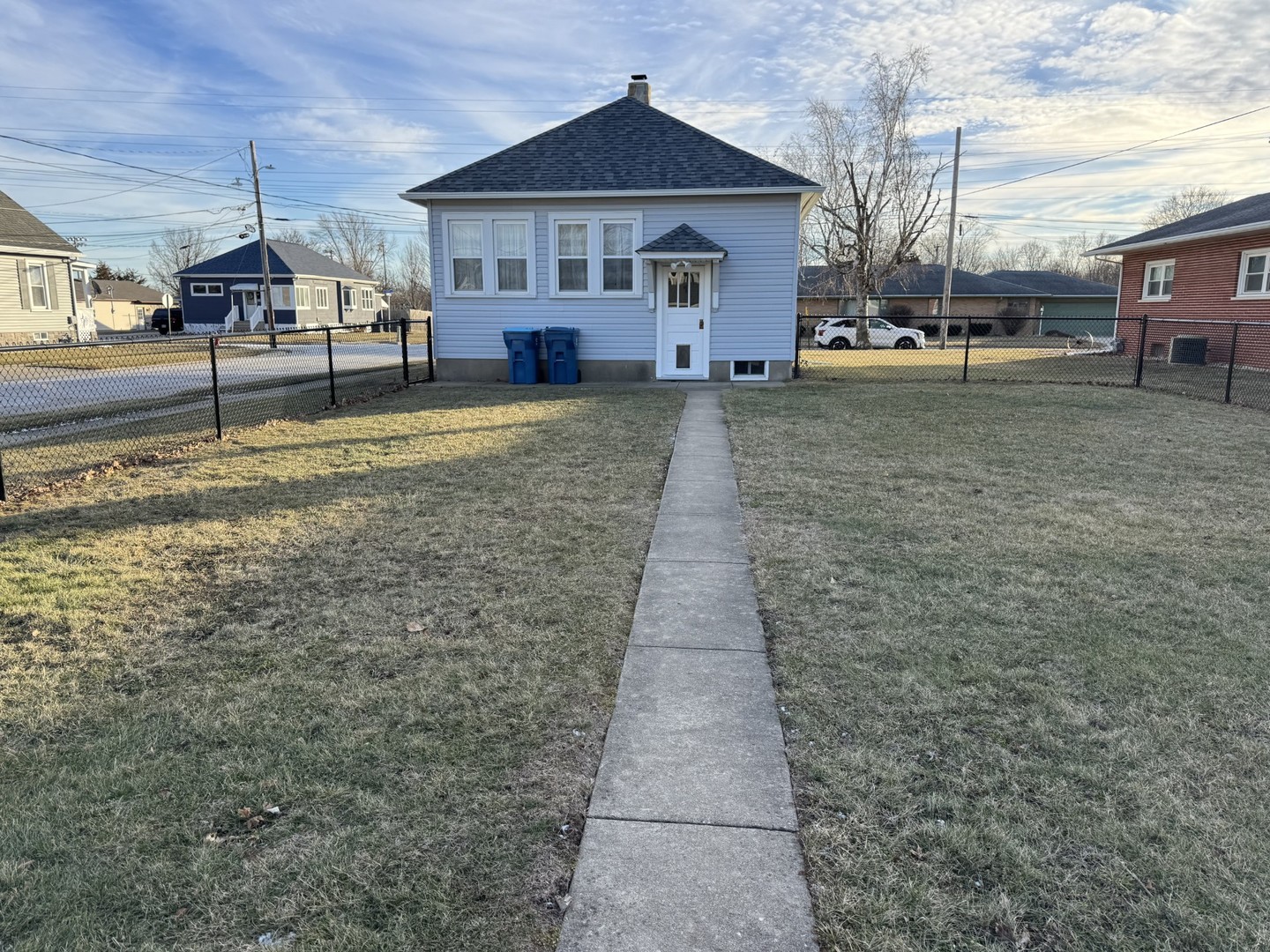 102 West 3rd Street Oglesby, IL 61348 - Photo 2 of 12 a view of a house with a yard
