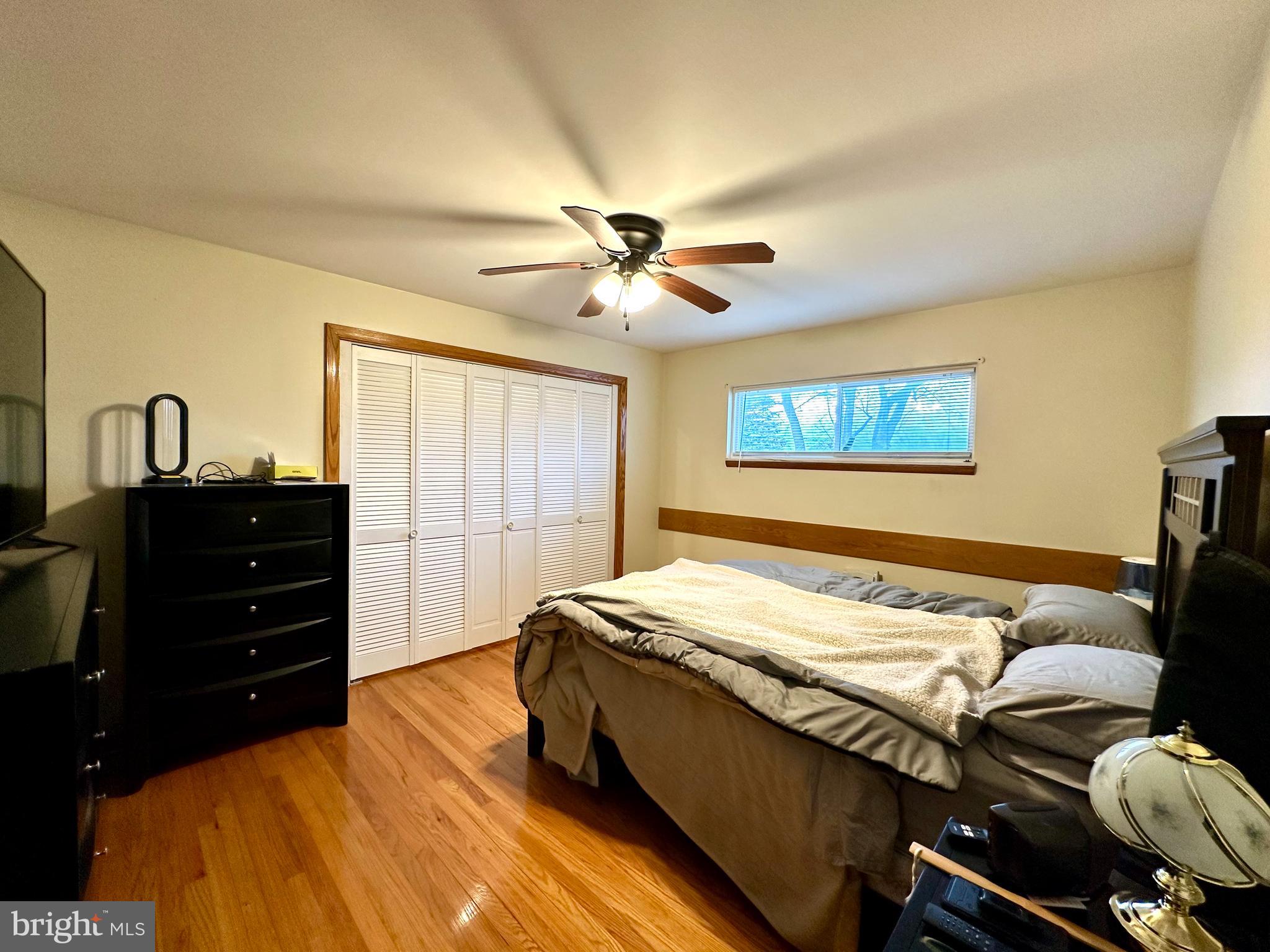 909 East Main Street Roaring Spring, PA 16673 - Photo 20 of 41 a bedroom with a bed and wooden floor